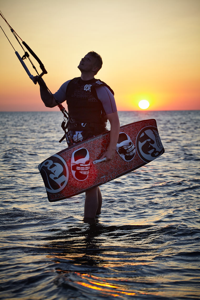 Wake boarder at sunset